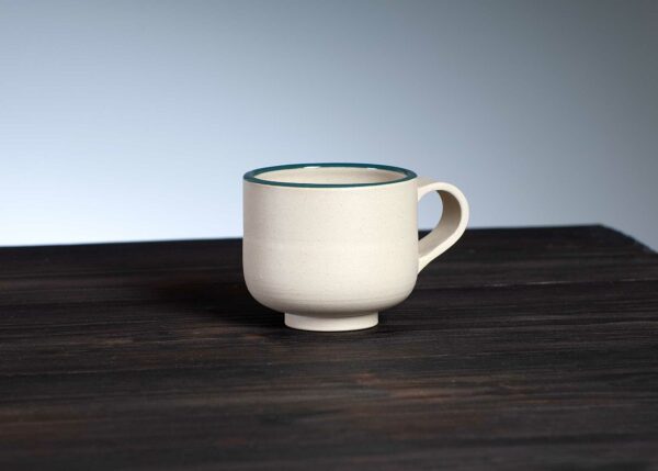 front view of espresso cup with red rim