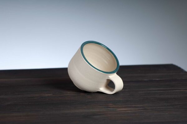 top view of espresso cup with teal rim