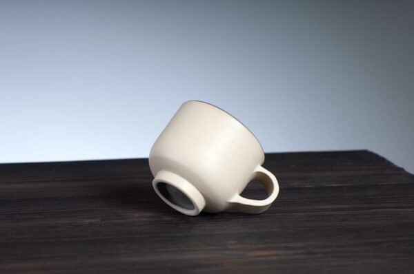 bottom view of espresso cup with grey rim