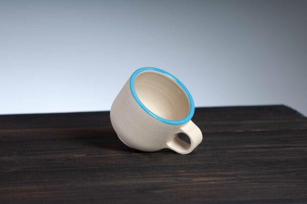 top view of espresso cup with blue rim