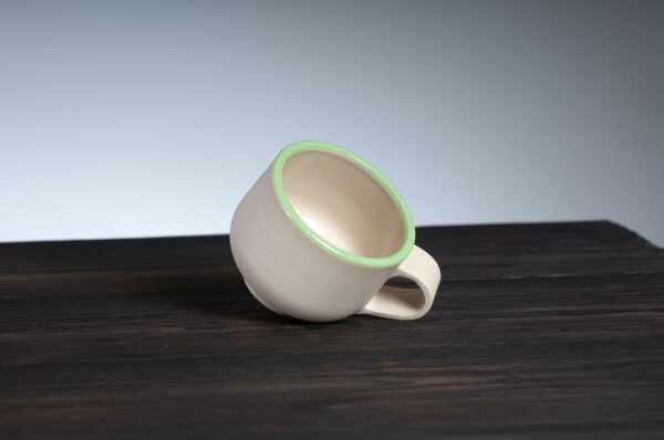 top view of espresso cup with green rim