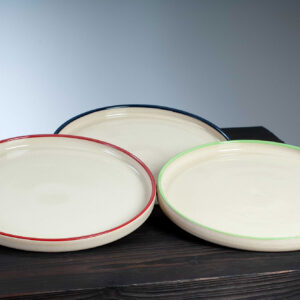 Selection of dinner plates in navy red and green