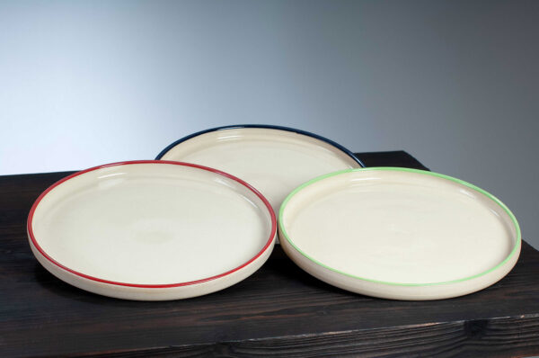 Selection of dinner plates in navy red and green