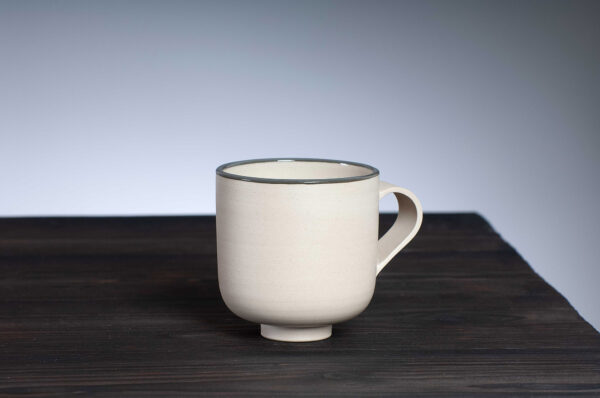 front view of stoneware mug with grey rim