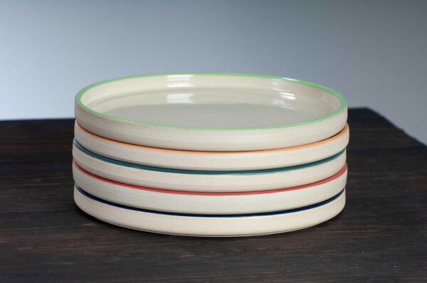 stacked selection of side plates in range of colours