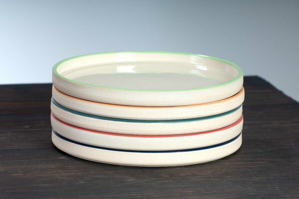 stacked selection of side plates in range of colours